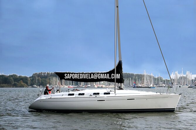 6 hours sailing tour with audio guides and typical Sardinian cuisine - Starting at Faro and Settling Onto Cetacea