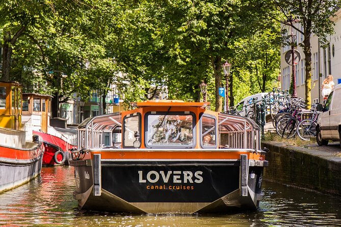 Amsterdam 1h Canal Cruise by Semi-Open Boat with Audio Guide - Red Light District and the central canal route