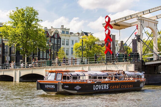 Amsterdam 1h Canal Cruise by Semi-Open Boat with Audio Guide - Merchant houses and Amsterdam’s narrow façades