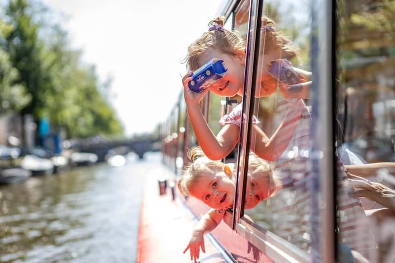 Amsterdam: 75 Minute City Canal Cruise with Audio Guide - Audio guide, live commentary, and the kids’ version