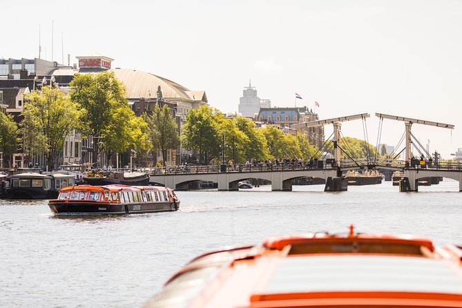 Amsterdam Sightseeing Canal Cruise with Audio Guide - The eastern route: museums, ships, and modern Amsterdam