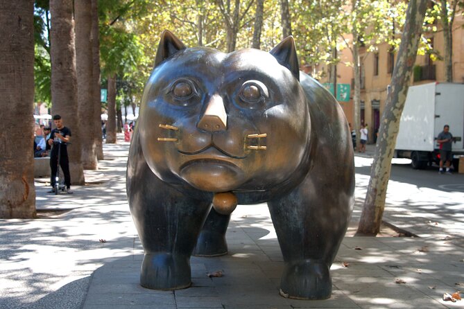 Barcelona's El Raval and the Gothic Quarter: A Self-Guided Audio Tour - Stories around Palau Güell and Carrer d’Avinyó