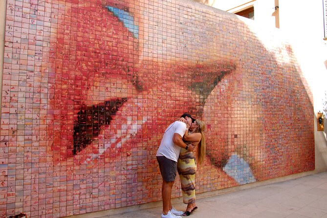 Barcelona's El Raval and the Gothic Quarter: A Self-Guided Audio Tour - Barcino, Roman walls, and the kissing mural