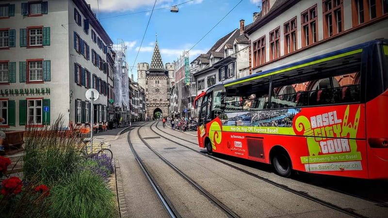 Basel: Sightseeing Bus Tour with Audio Guide - The old center, from Marktplatz to the Middle Bridge
