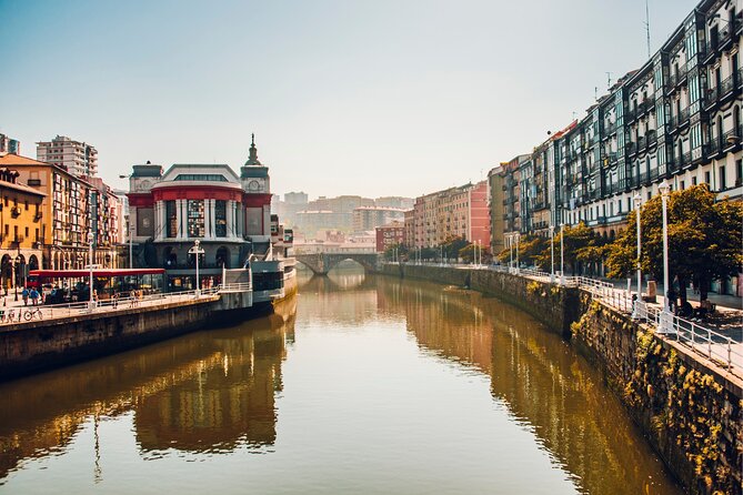 Bilbao Scavenger Hunt and Highlights Self Guided Audio Tour - Zubizuri bridge shifts the walk toward the river