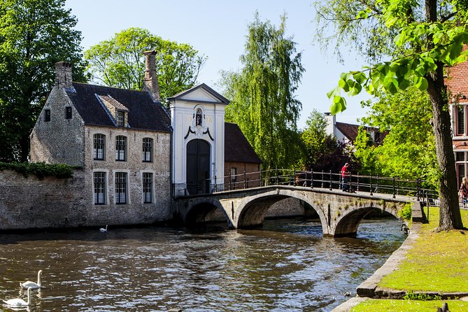 Bruges Day Trip with Audio Guide Option from Paris - Canals, the Lake of Love, and the famous bridge