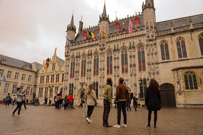 Bruges Guided or Audio Trip with Canal Cruise Option from Paris - Entering Bruges through the medieval center