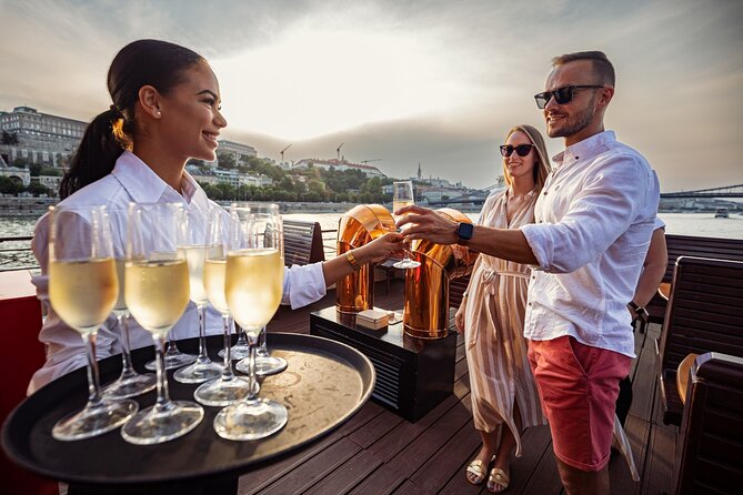 Budapest Paddle Steamer Danube Cruise with Tokaj & Audio Guide - Indoor comfort, outdoor photos, and onboard drinks
