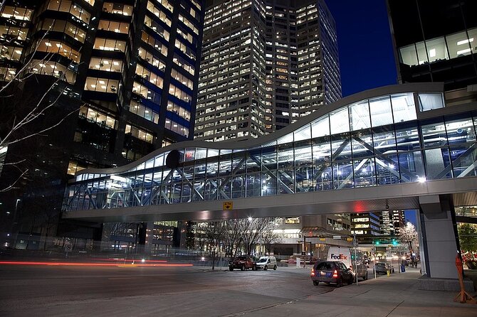 Calgary Self Guided Audio Experience - Pausing at Conversation Sculpture and Wonderland