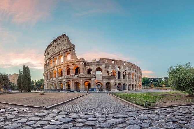 Colosseum, Forum, Palatine Hill with audio guide and Arena or Bus option - Entering the Colosseum and seeing the first two rings
