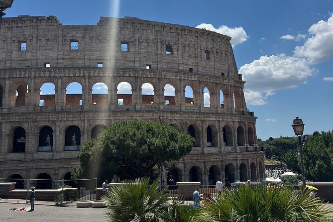 Colosseum, Palatine Hills & Roman Forum Ticket with Audio Guide - Walking through the Roman Forum