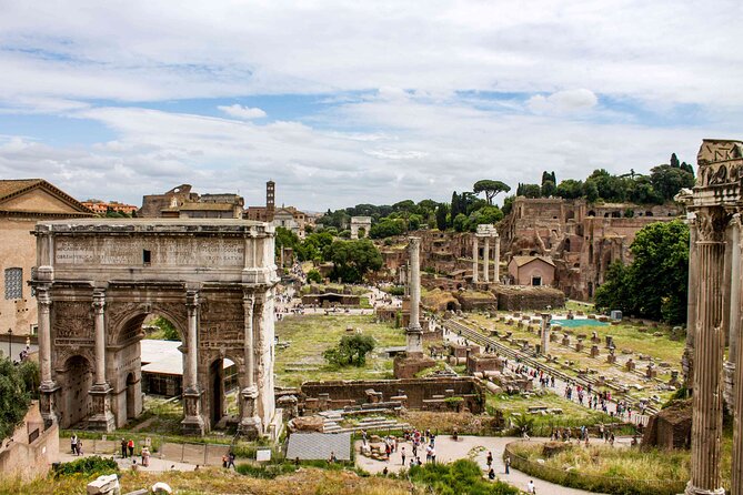 Colosseum, Roman Forum and Palatine Hill Tour With Audio - Walking through the Roman Forum