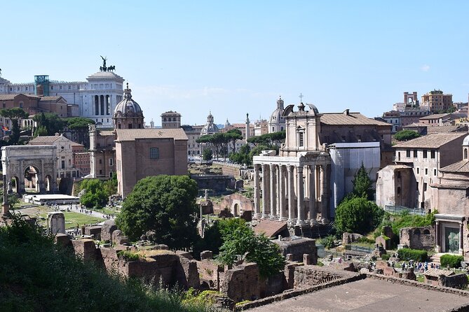 Colosseum with Digital Audioguide and Arena Option - Walking through the Roman Forum