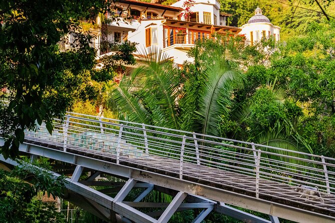Discover Puerto Vallarta: Audio Walking Self-Guided Tour - Crossing the Cuale River on the Iguana Bridge