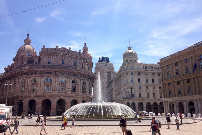 Finance and Nobility: Explore medieval Genoa on a self-guided audio tour - Piazza Caricamento and the port built outward