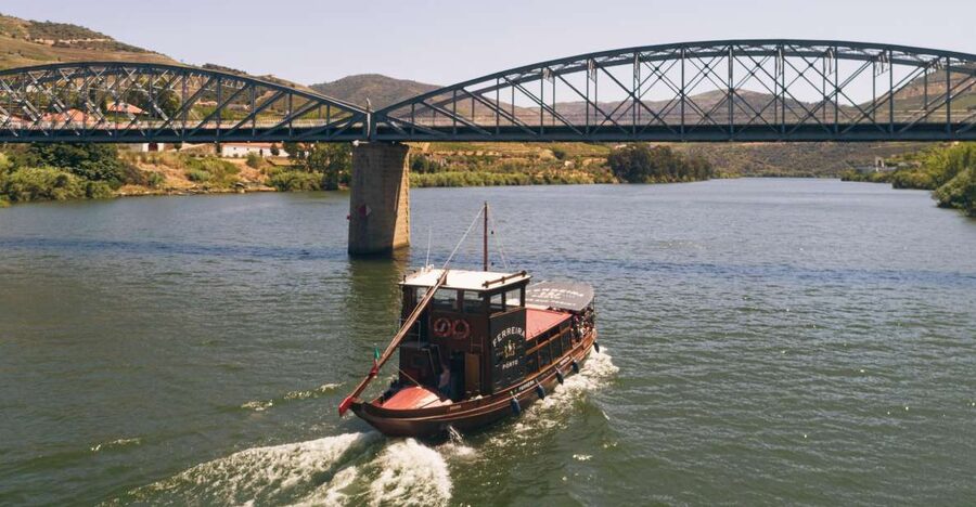 From Pinhão: Douro Valley Rabelo Boat Tour with Audio Guide - Boarding a traditional Rabelo boat