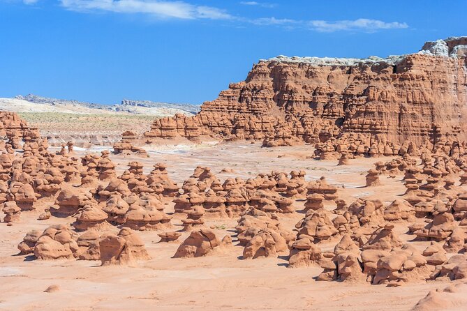 Goblin Valley Self Guided Driving Audio Tour - Temple Mountain Wash Pictograph Panel: ancient art beside the road