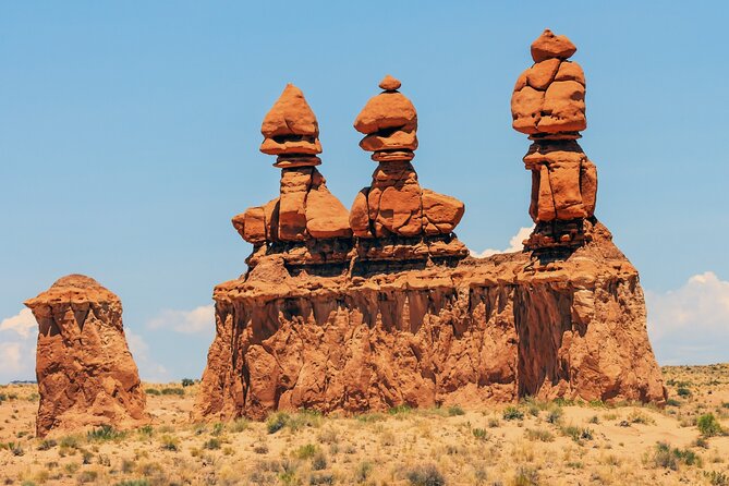 Goblin Valley Self Guided Driving Audio Tour - Molly’s Castle: a red-rock fortress in the distance