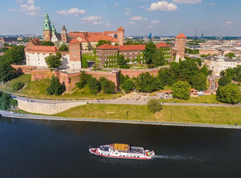 Krakow: Vistula River Sightseeing Cruise with Audio Guide - The boats, seating, and sound