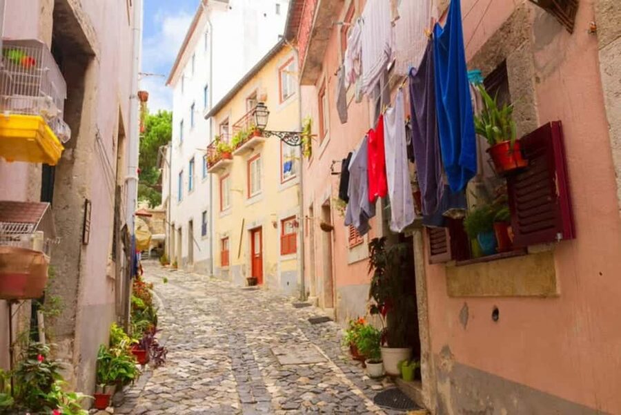 Lisbon: City Audio Guide with 24-Hour Transportation Pass - Key points at a glance