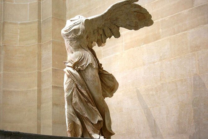 Louvre Museum and Arc de Triumph Tickets with Audio Guide - Climbing the Arc de Triomphe for the city view