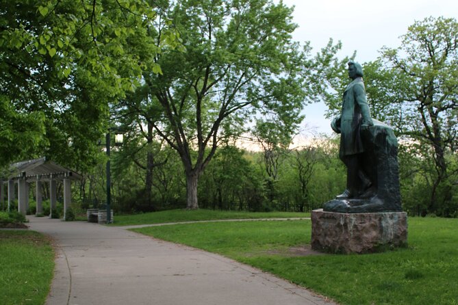 Minnehaha Falls: A Self-Guided Audio Tour of Minneapolis - Statues reward a slower walk