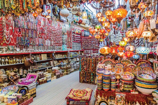 Muscat Half Day City Tour with Audio Guiding - Muttrah Fish Market shows the working harbor
