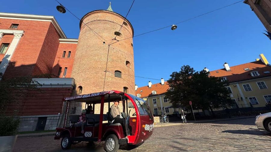 Old Riga Heated E-Bus Tour with Audio Guide & Mulled Wine - What the audio guide adds, and where it falls short