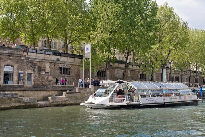 Paris: Batobus Hop-On Hop-Off Cruise & Landmarks Audio Tour - Quai de Montebello and Notre Dame