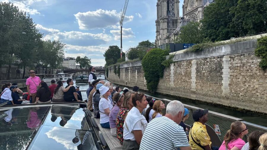 Paris: Illuminations River Cruise with Audio Commentary - Boarding beneath the Eiffel Tower