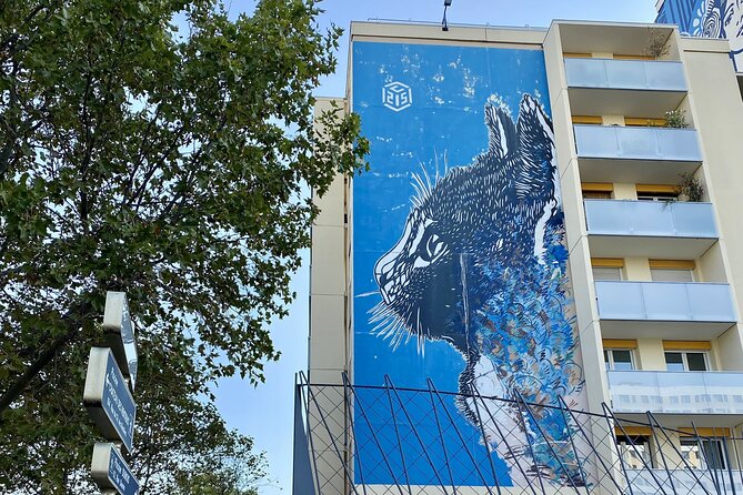 Paris Street Art, smartphone audioguided tour - Rue Pinel explains the business behind the paint
