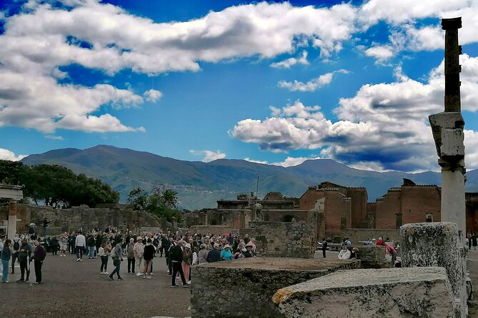 Pompeii from Naples: Smart Audio Guide with Travel Instructions - The Lupanar, theaters, and public entertainment