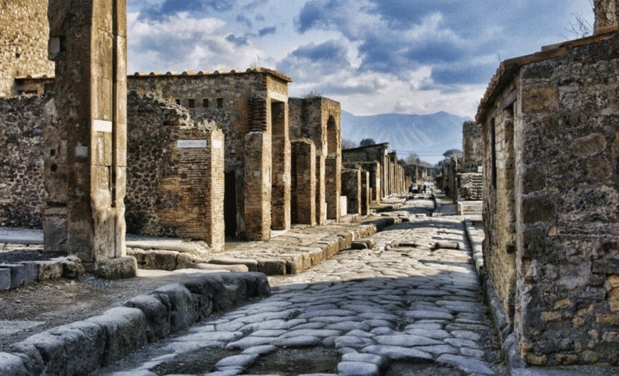 Pompeii: Skip-the-Line Entry Ticket with Audio Guide or Tour - Entering the city through streets buried by Vesuvius