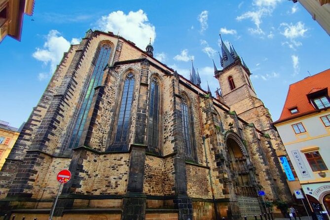Private Self-Guided Audio Walking Tour in Prague - Týn Church rises above Old Town