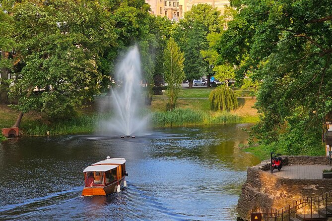 Riga Canal and Daugava Boat Tour with Welcome Drink & Audio Guide - The Freedom Monument from the water