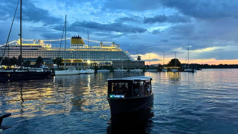 Riga: Canal Boat Tour with Drink & Old Town Audio Tour - Under 19 bridges and onto the Daugava