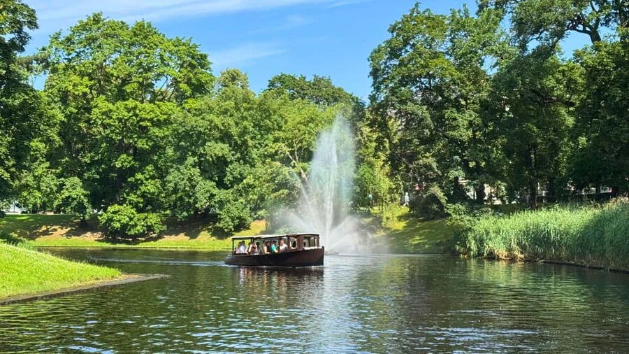 Riga: Canal Boat Tour with Welcome Drink & Audio Guide - Riga by water: key points at a glance