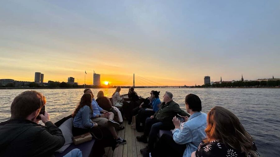 Riga: Canal Boat Tour with Welcome Drink & Audio Guide - Seating, drinks, and comfort on the old boat