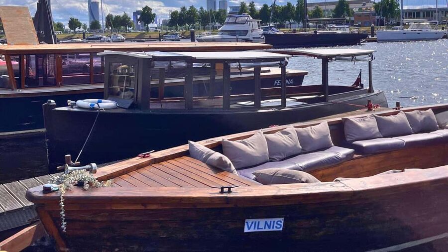 Riga: Canal Boat Tour with Welcome Drink & Audio Guide - Starting at Andrejosta, away from the postcard center
