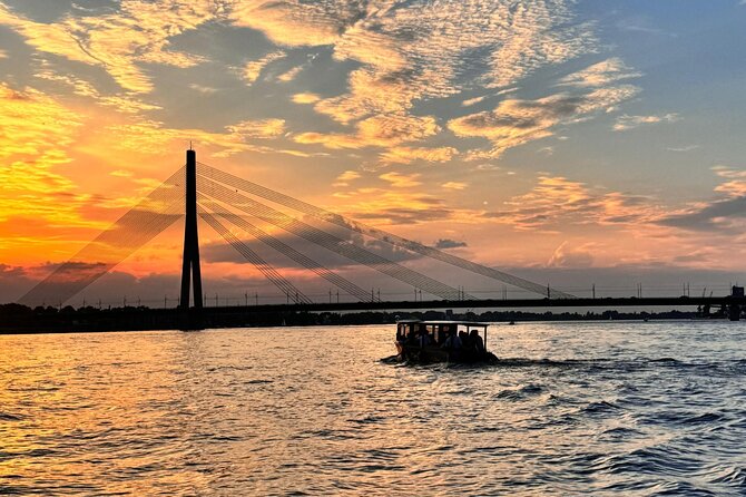 Riga: Evening or Sunset Boat Tour with Drink and Audio Guide - The river views and Riga’s best landmarks
