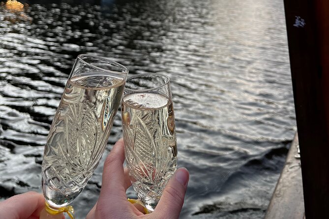Riga: Evening or Sunset Boat Tour with Drink and Audio Guide - How useful is the audio guide?