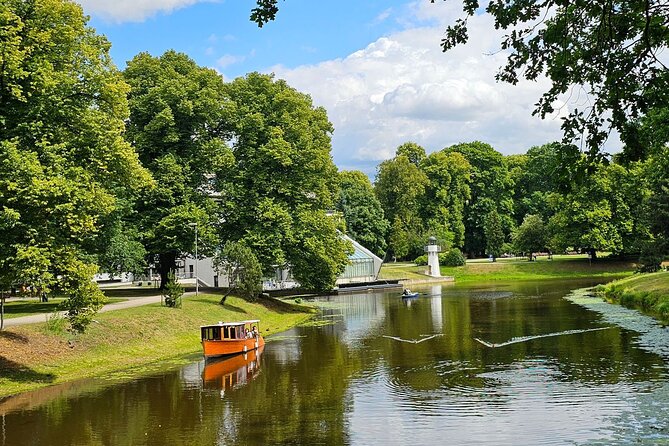 Riga: Evening or Sunset Boat Tour with Drink and Audio Guide - Price and overall value at $13.88