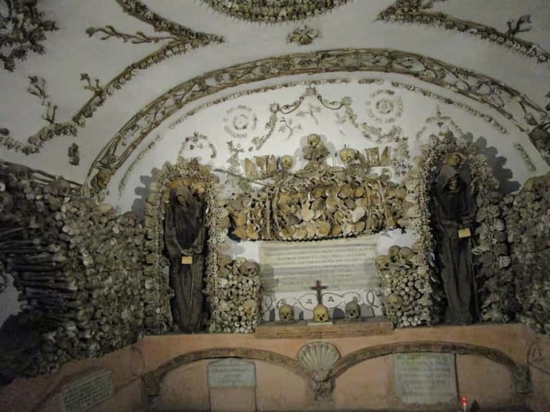 Rome: Capuchin Crypts Guided Tour with Audio Guide Option - Entering the Crypt of the Three Skeletons