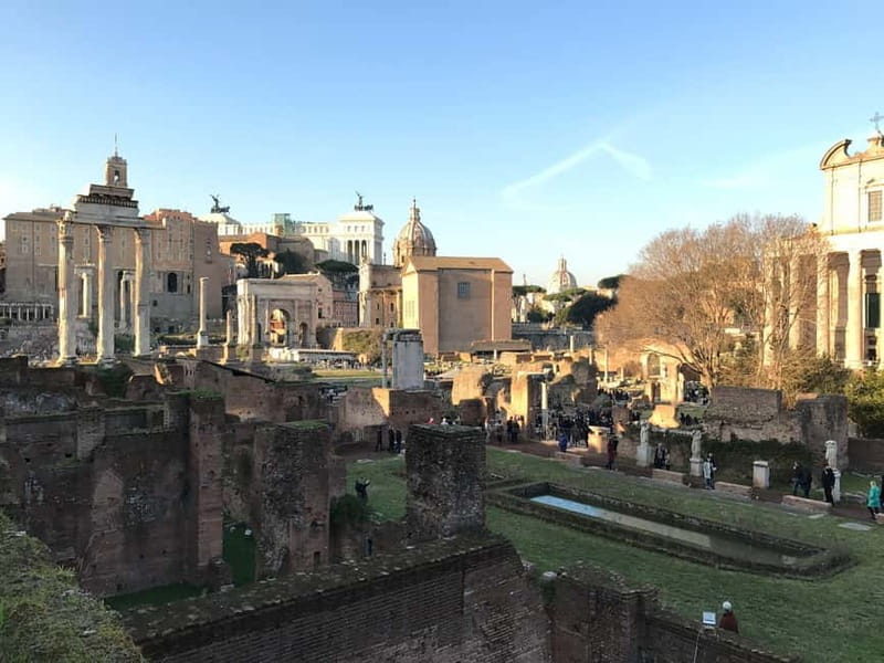 Rome: Colosseum, Forum Audio Tour with Hop-on Hop-off Bus - Taking the open-top bus around Rome