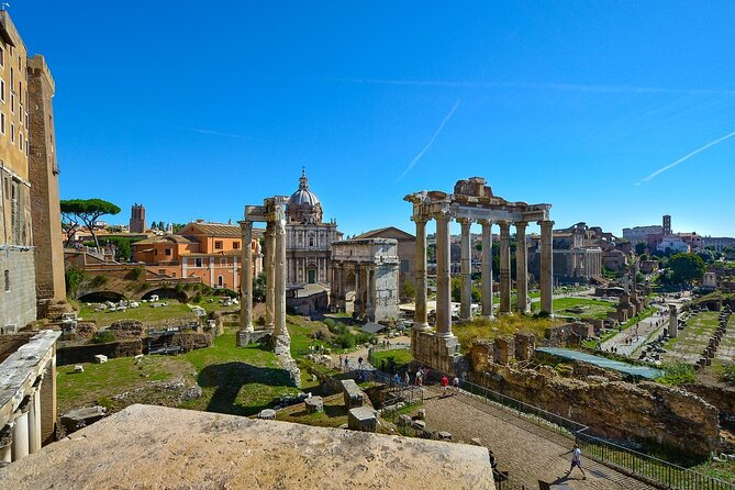 Rome: Colosseum, Forum, & Palatine Hill with Audio Guide - Entering the Colosseum with an audio guide