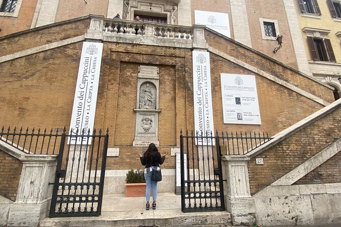 Rome’s Bone Chapel with Audioguide App and Panoramic Bus Transfer - The museum collection before the crypt