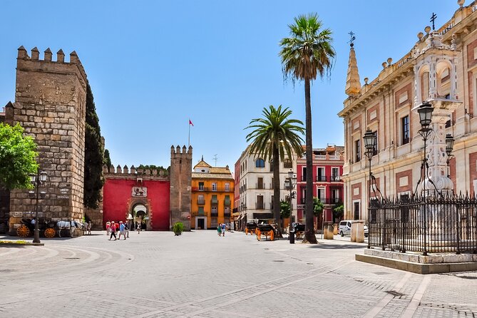 Seville Scavenger Hunt and Highlights Self Guided Audio Tour - Torre del Oro beside the river