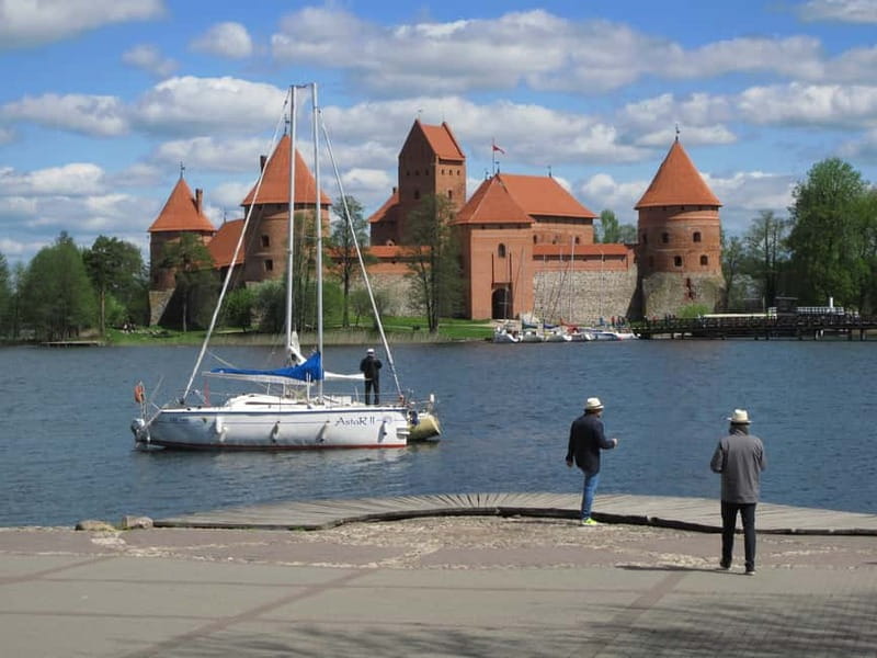 Vilnius: Trakai Tour with Audio Guide and Minibus Transfers - Reaching the castle through Trakai’s small center