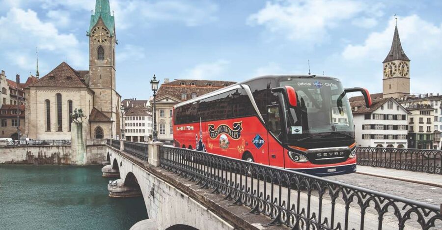 Zurich: City Bus Tour with Audio Guide and Lake Cruise - Bahnhofstrasse, the banks, and the lake